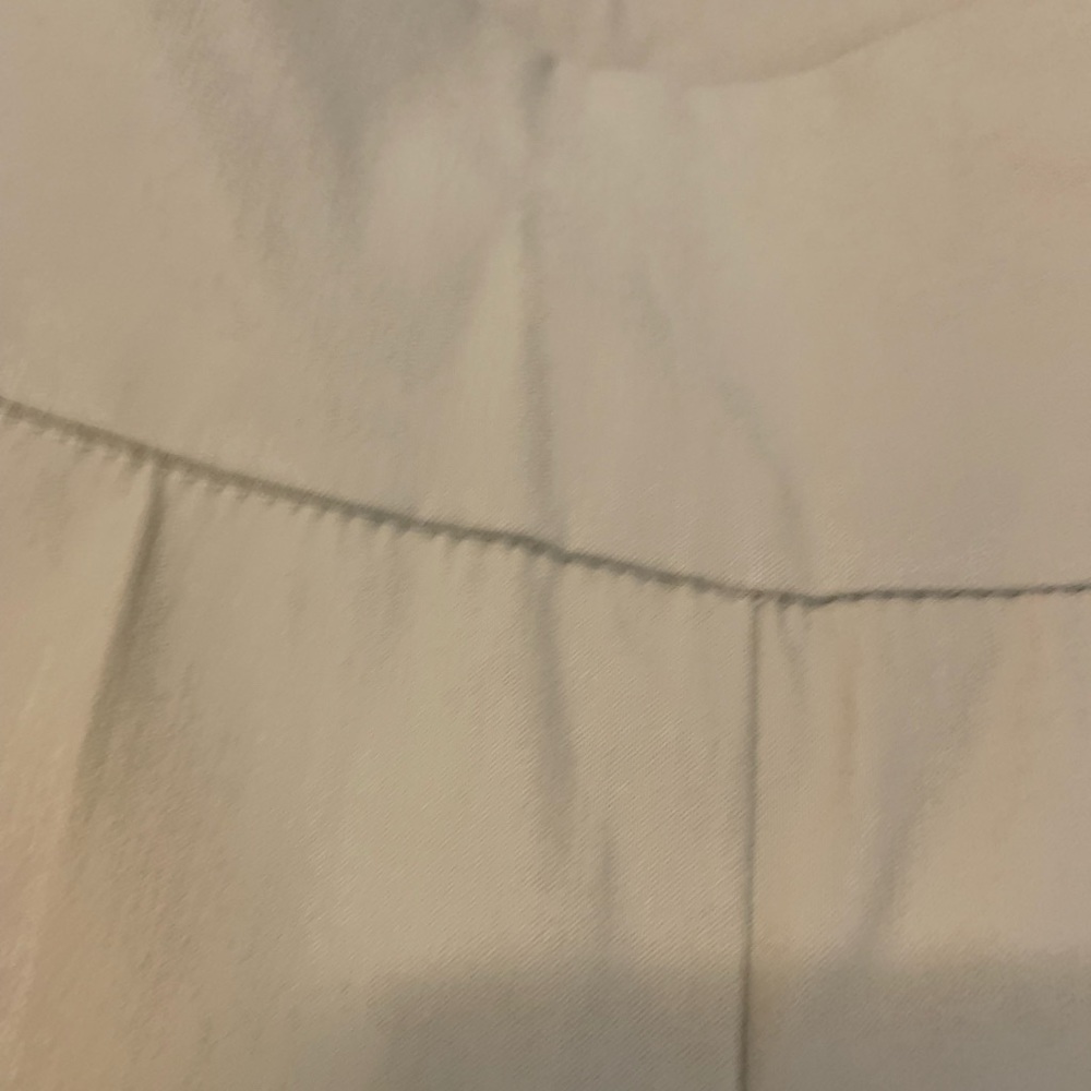 New directions beige capris size 14.  These are new with tags on.  21” inseam.